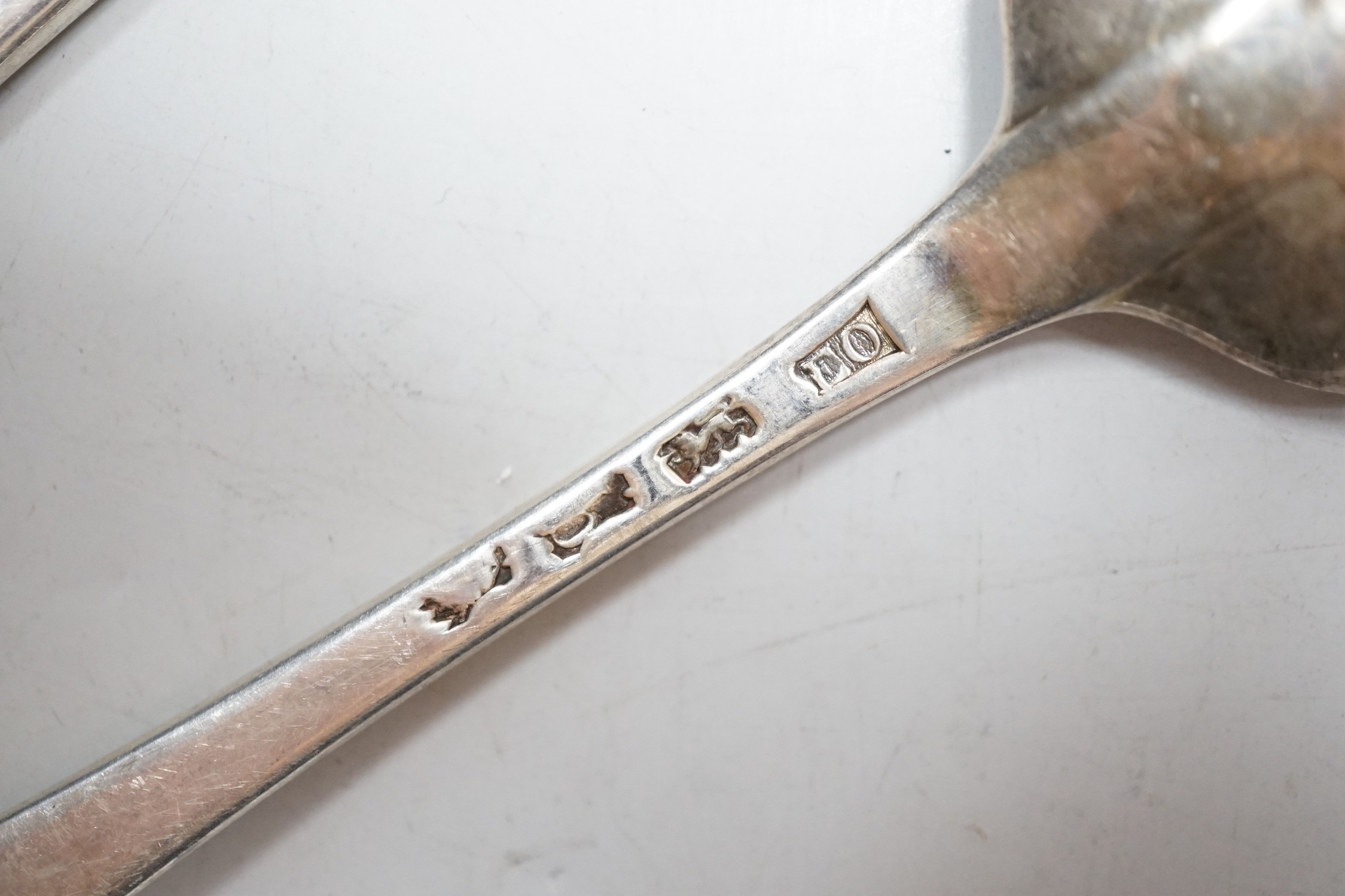 Nine George II silver Hanovarian? pattern tablespoons, eight by Elizabeth Oldfield, London, 1751, 20.7cm, 19.6oz, although some hallmarks are rubbed.